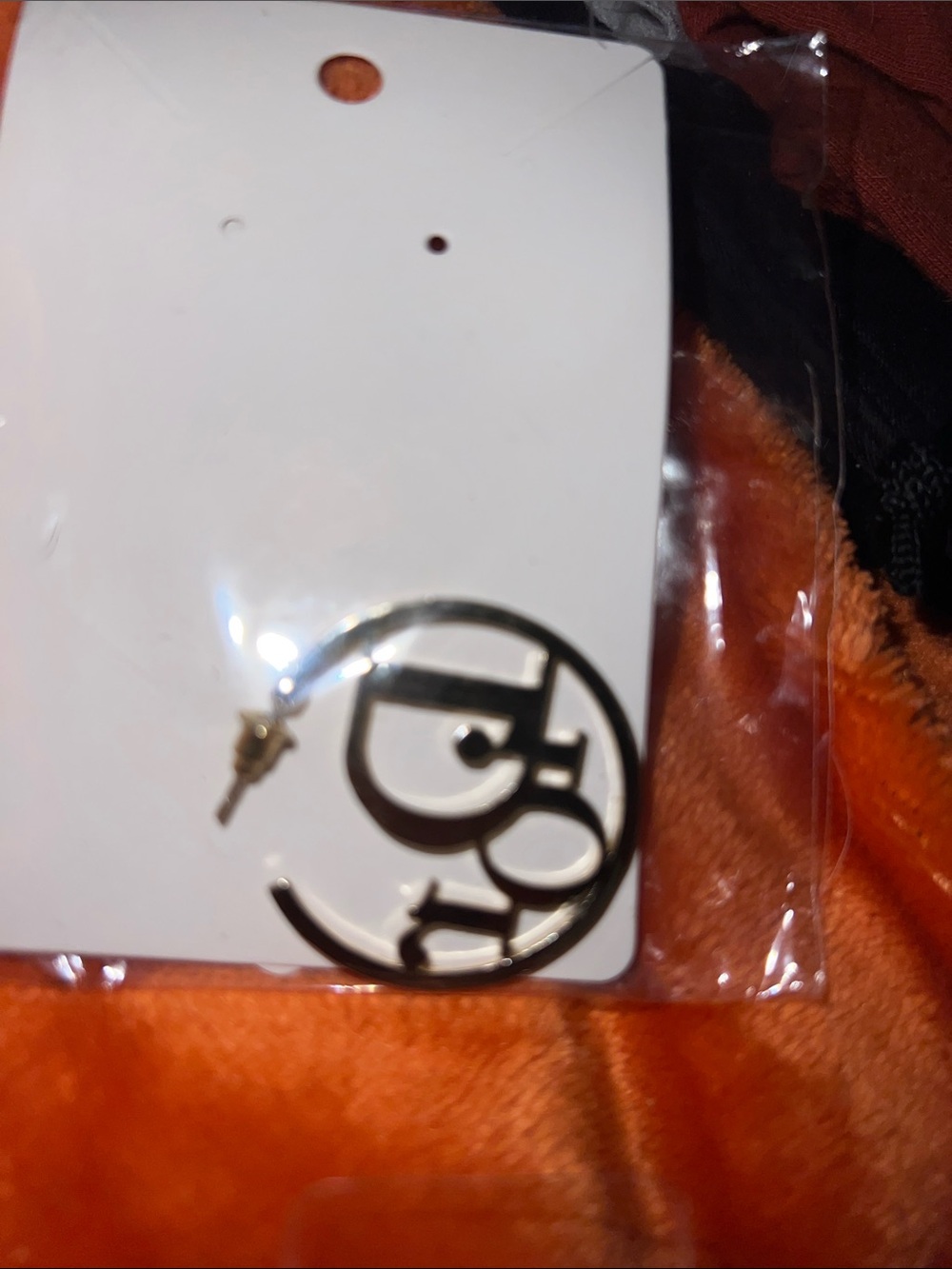 Gold-Tone Hoop Earrings with Monogram Cutout